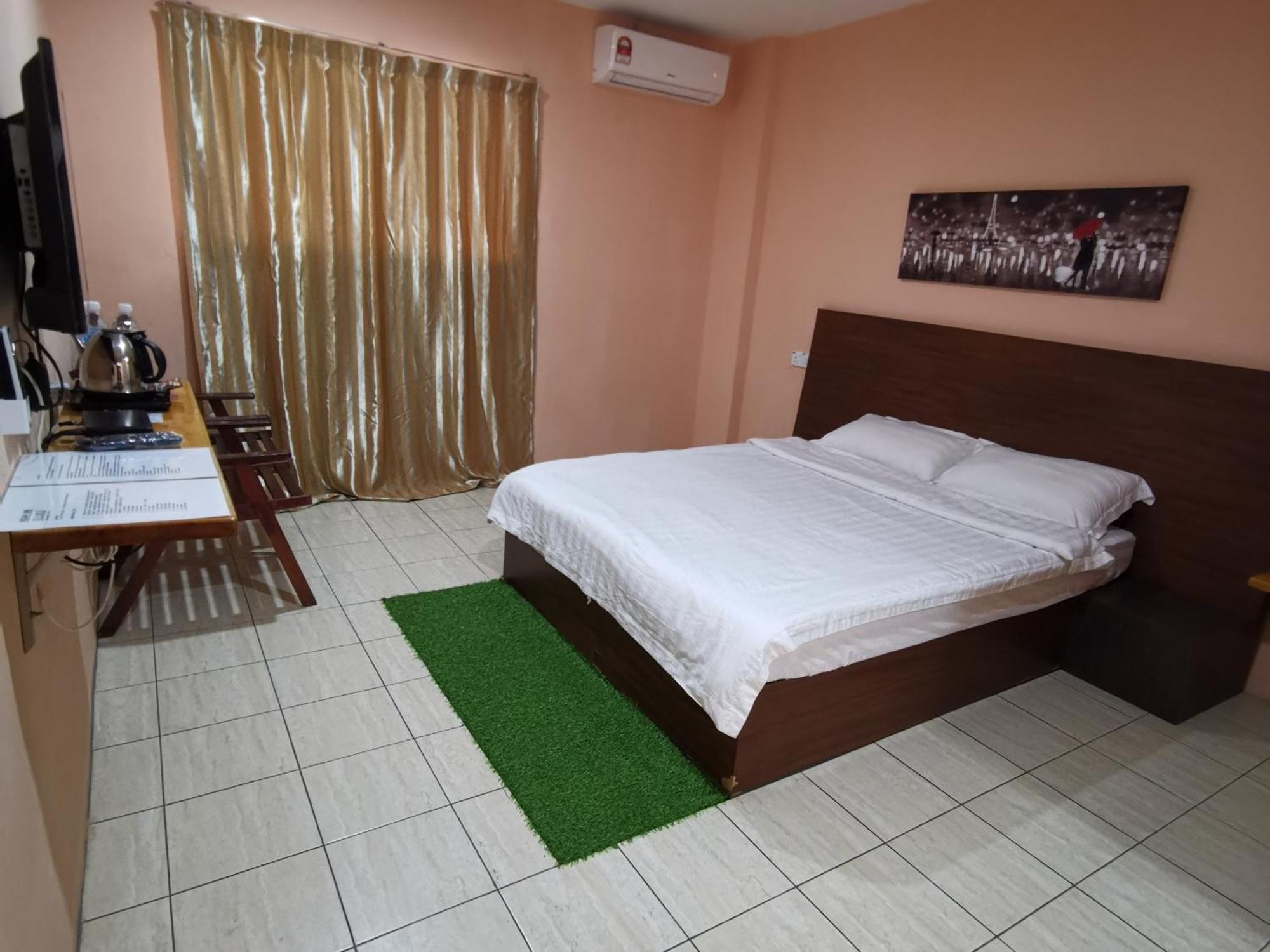 Indah Inn Tawau Rum bild