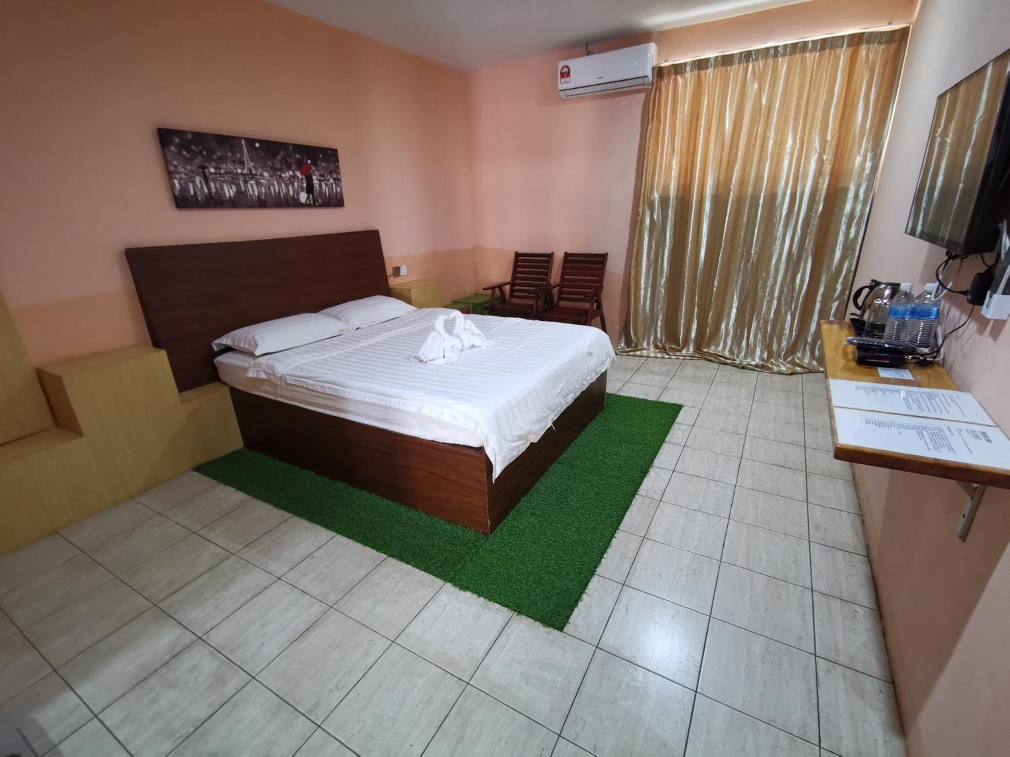 Indah Inn Tawau Rum bild